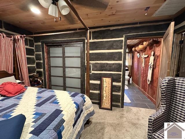 unfurnished bedroom with wooden ceiling and visible vents