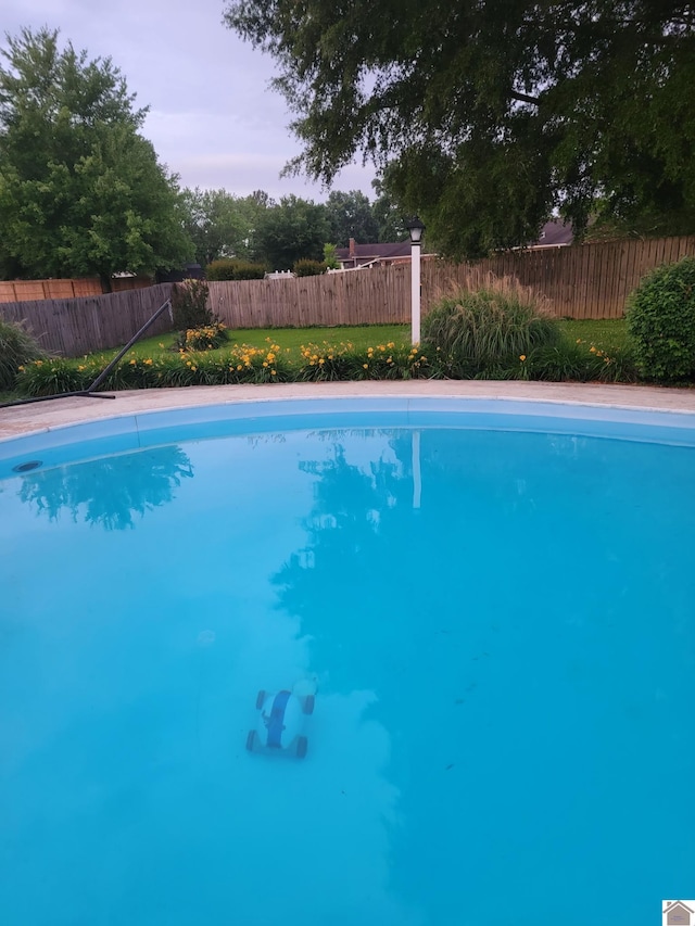 view of pool with a fenced backyard and a fenced in pool