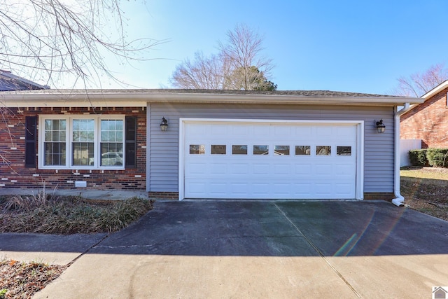 garage with driveway