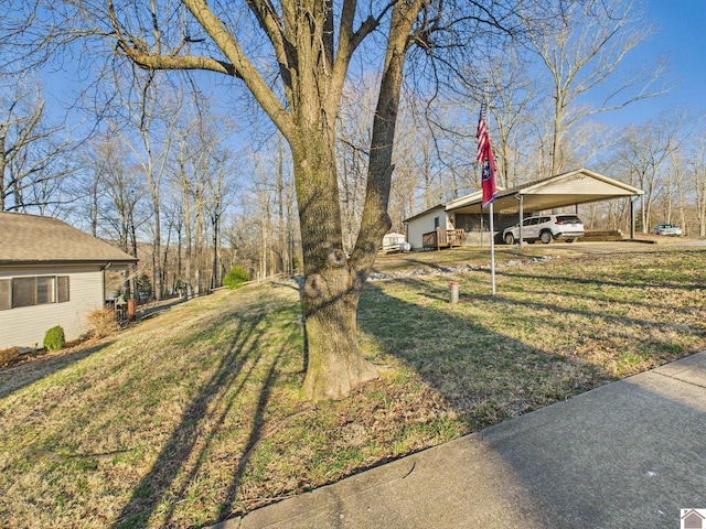 view of yard with a carport