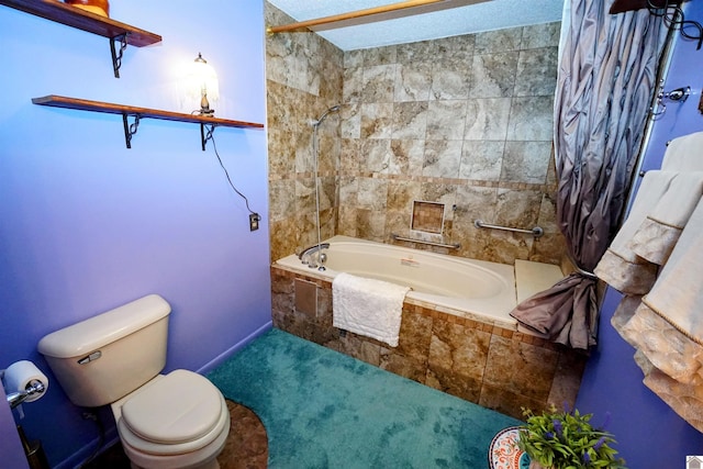 full bath with tiled shower / bath, a textured ceiling, and toilet