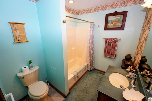 full bath with visible vents, vanity, toilet, and baseboards