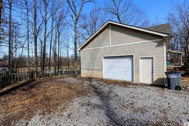 detached garage with fence