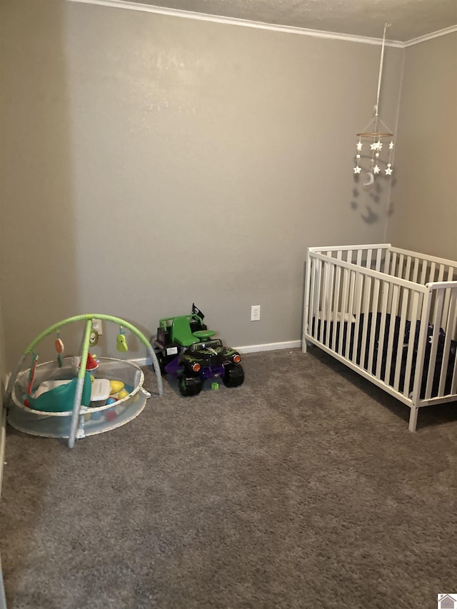 unfurnished bedroom with baseboards, carpet flooring, and crown molding