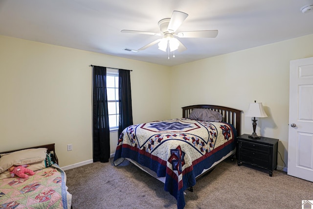 3929 Griggstown Rd, Calvert City, KY 42029 - carpeted bedroom featuring ceiling fan, visible vents, and baseboards