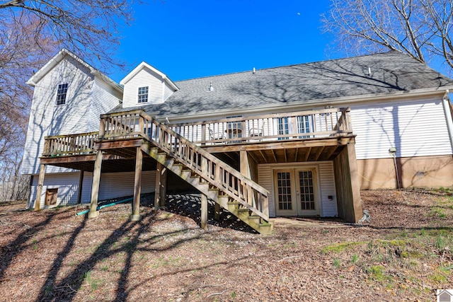 3929 Griggstown Rd, Calvert City, KY 42029 - back of house with roof with shingles, stairway, a deck, and french doors