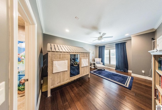 bedroom with a ceiling fan, baseboards, ornamental molding, and hardwood / wood-style floors