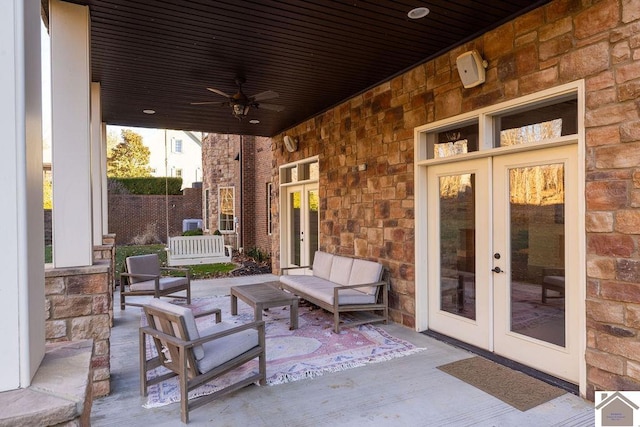 view of patio / terrace with french doors and a ceiling fan