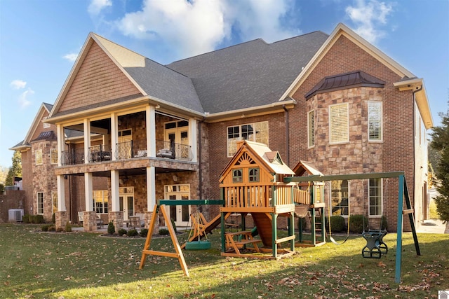 view of play area with a yard and cooling unit