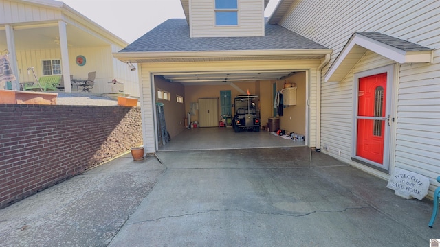 garage featuring driveway