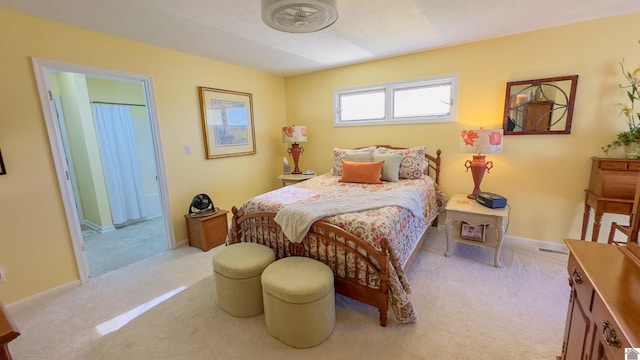 bedroom featuring carpet flooring and baseboards