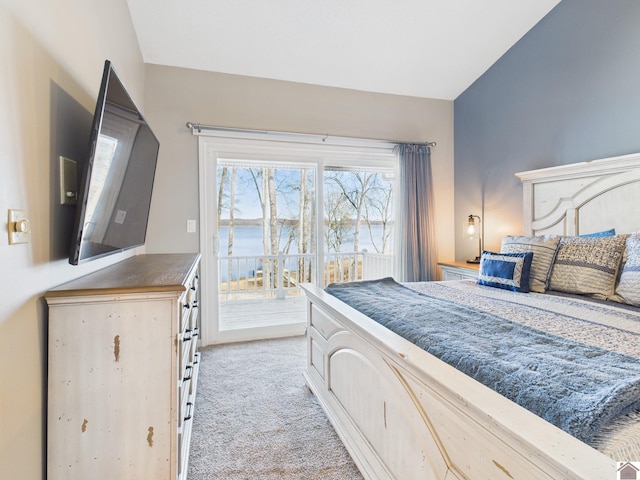 bedroom featuring light colored carpet