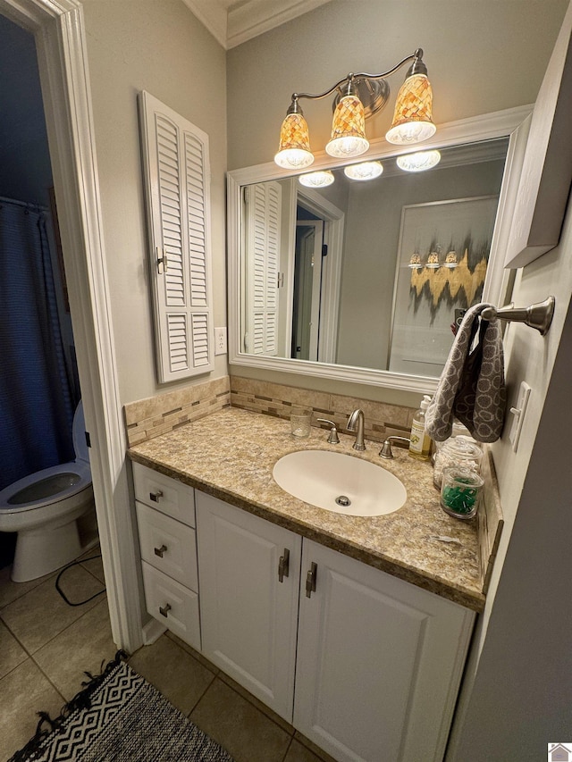 full bathroom featuring toilet, tile patterned flooring, vanity, and crown molding