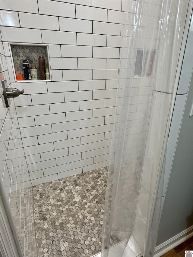 full bathroom with a stall shower