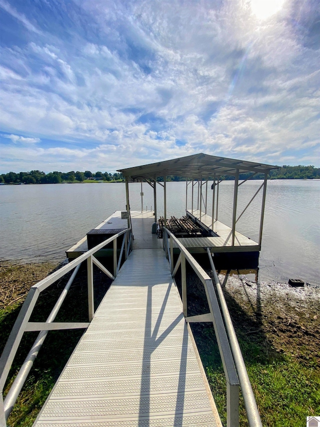 dock area featuring a water view