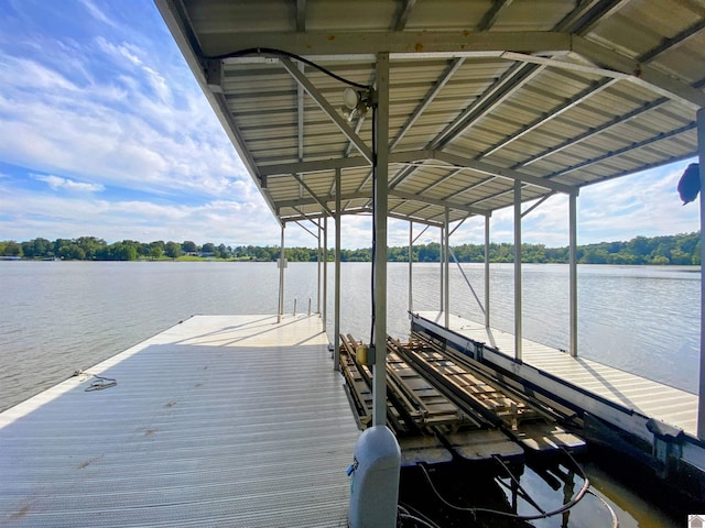 view of dock featuring a water view and boat lift