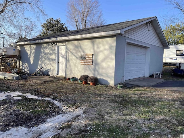 detached garage with driveway