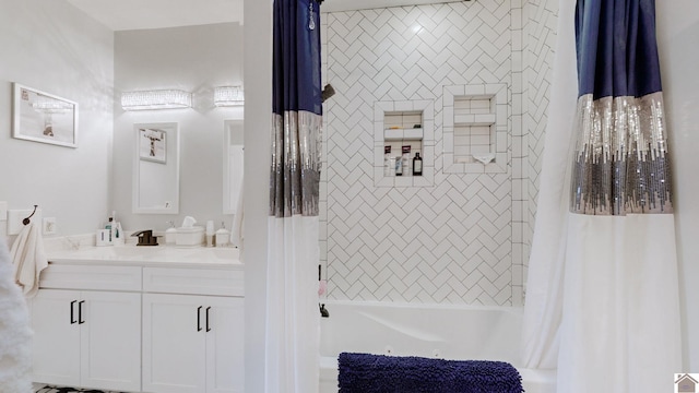 bathroom featuring vanity and shower / bath combo