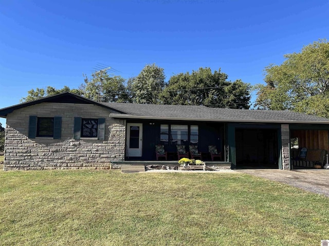 ranch-style house featuring stone siding, driveway, a front yard, and an attached garage