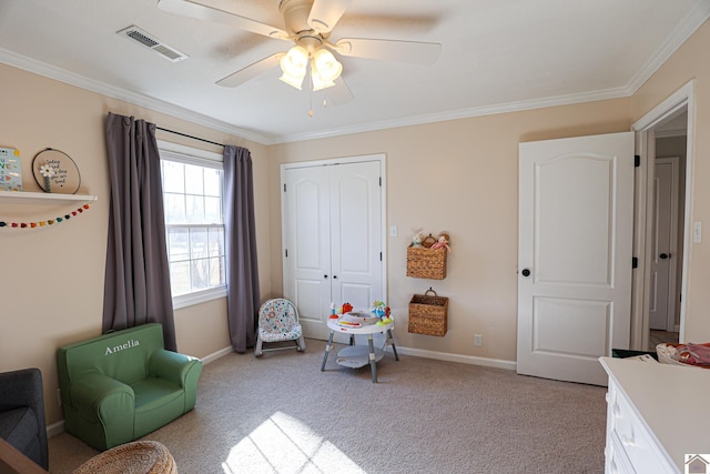 interior space with baseboards, visible vents, a closet, light carpet, and crown molding