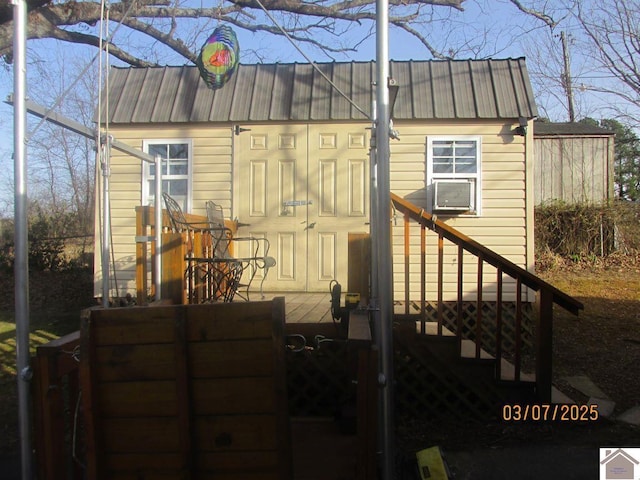 view of outbuilding with cooling unit