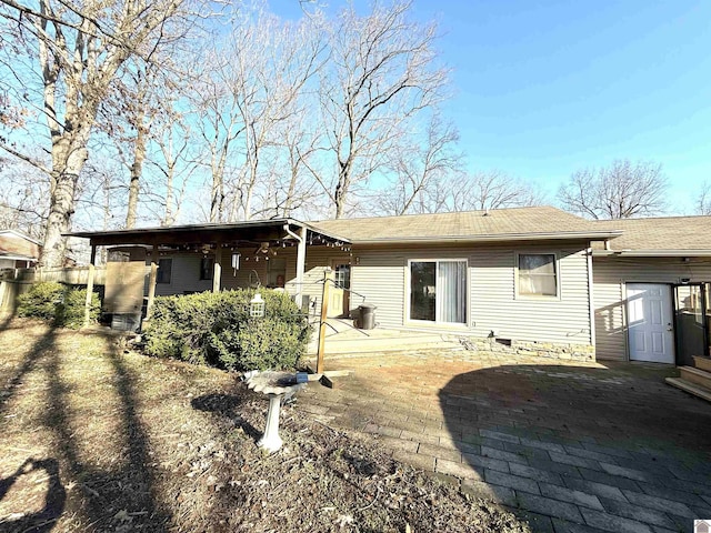 back of property with a patio area