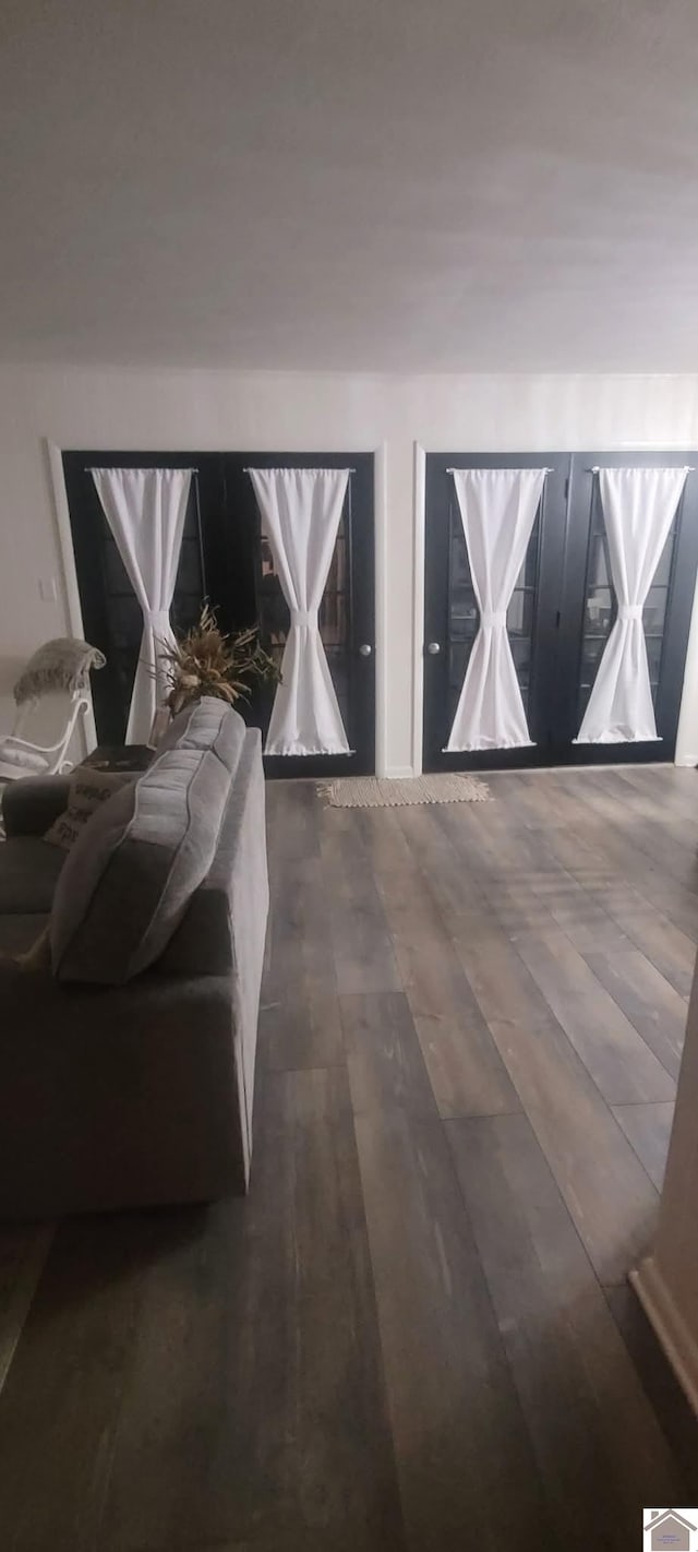 bedroom featuring dark wood finished floors