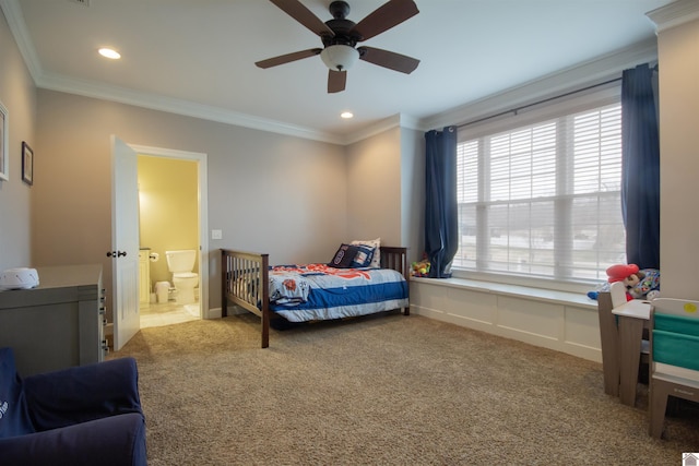 carpeted bedroom featuring ceiling fan, recessed lighting, ensuite bathroom, and ornamental molding