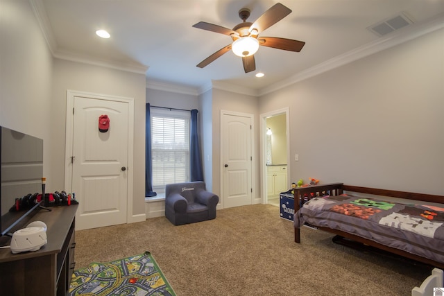 carpeted bedroom with visible vents, crown molding, baseboards, ceiling fan, and recessed lighting