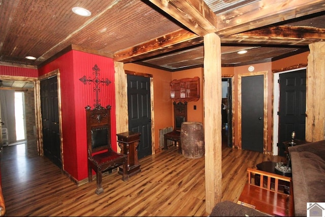 interior space featuring wooden ceiling and wood finished floors