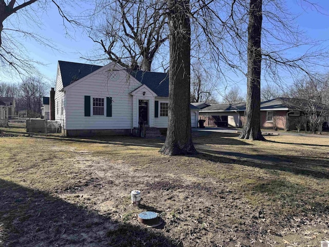 view of front of property with fence