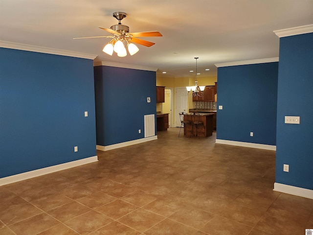 unfurnished living room featuring recessed lighting, ceiling fan with notable chandelier, crown molding, and baseboards