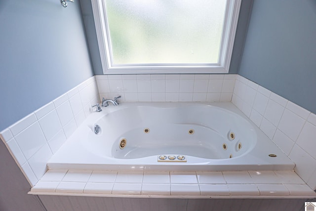 full bath with a jetted tub