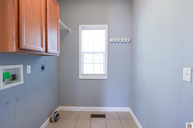 laundry area featuring visible vents, washer hookup, cabinet space, light tile patterned floors, and hookup for an electric dryer