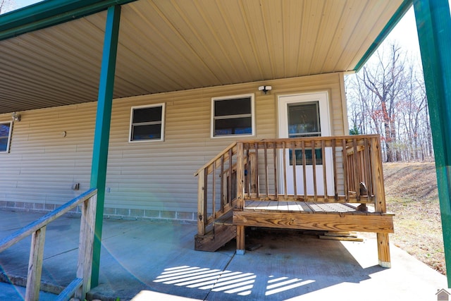 doorway to property featuring a patio area