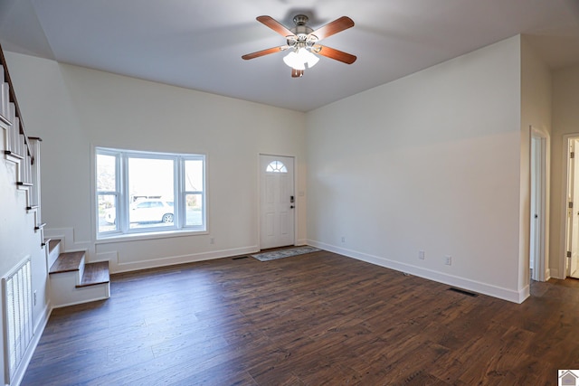 entrance foyer featuring dark wood-type flooring, baseboards, and visible vents