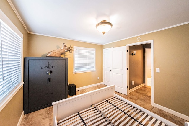 unfurnished bedroom featuring multiple windows, baseboards, and ornamental molding