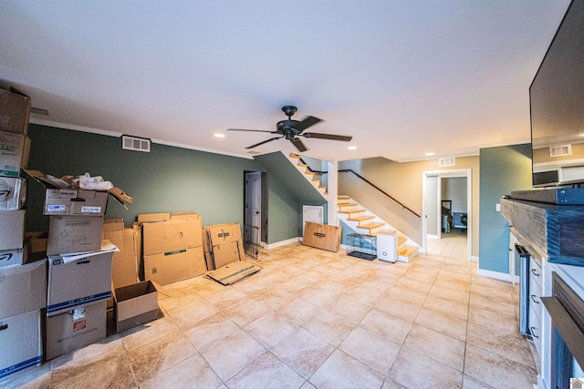 basement featuring stairway, recessed lighting, visible vents, and ceiling fan