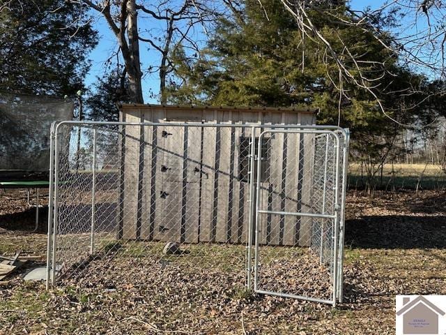 view of outdoor structure with a gate