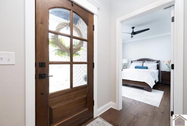 interior space with dark wood finished floors and baseboards