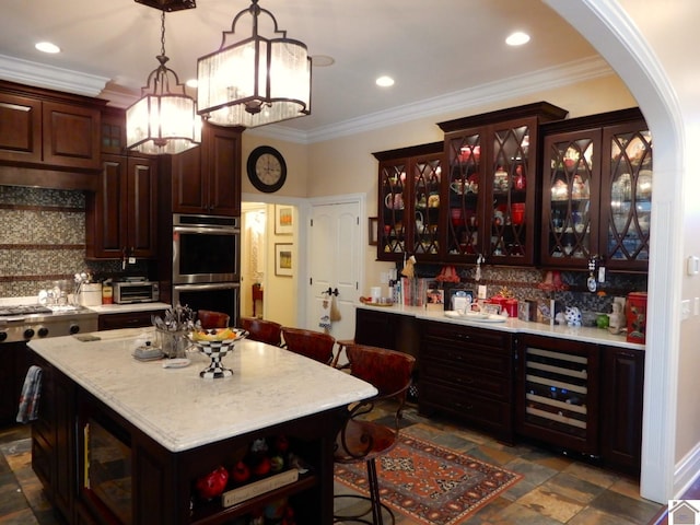 kitchen featuring stainless steel double oven, open shelves, light countertops, wine cooler, and crown molding