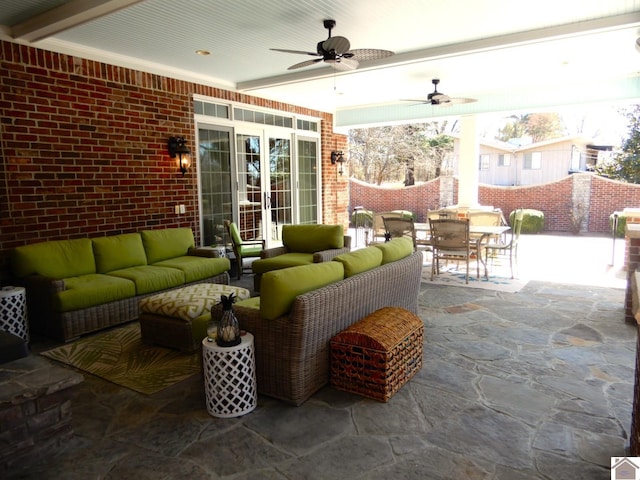 view of patio / terrace with a ceiling fan, outdoor dining area, french doors, and outdoor lounge area