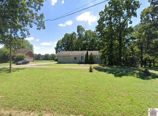 view of yard featuring a garage