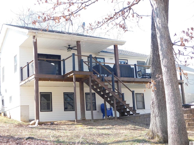 rear view of property with stairs, a wooden deck, and a ceiling fan