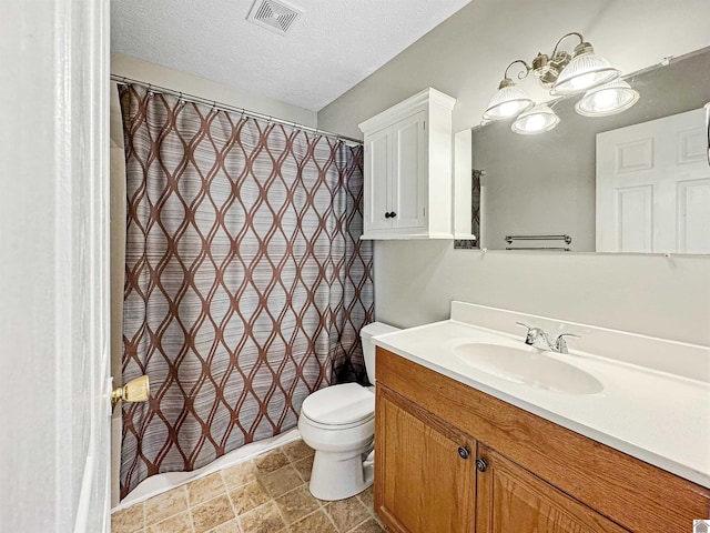 full bath featuring visible vents, toilet, a textured ceiling, a shower with shower curtain, and vanity