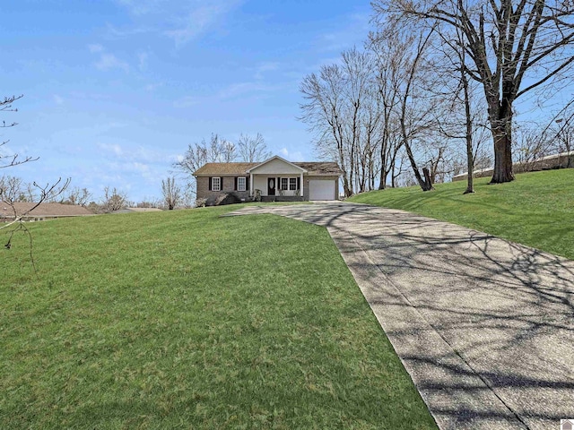 view of front of home featuring concrete driveway, an attached garage, brick siding, and a front yard