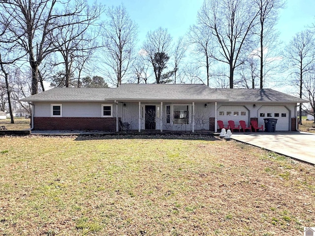 ranch-style house with brick siding, a front lawn, a porch, driveway, and an attached garage