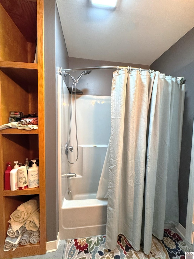 full bath featuring shower / tub combo