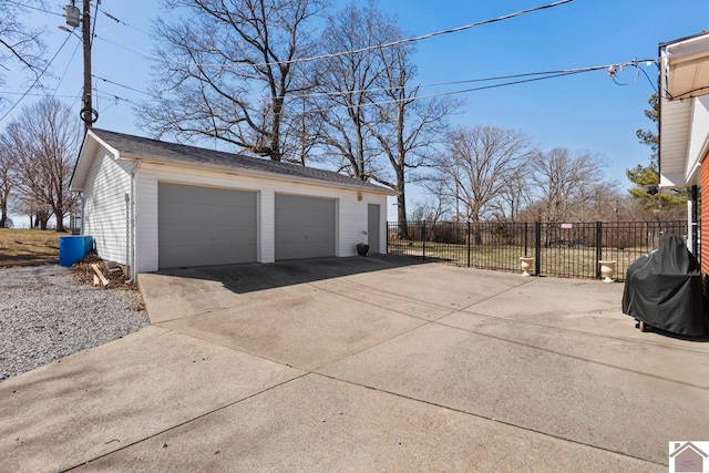 detached garage with fence