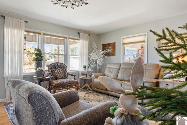 living area featuring plenty of natural light and light wood-style flooring